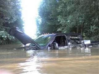 Illustration for article titled Michigan Fairground Floods, Waterlogging Hundred Of Cars